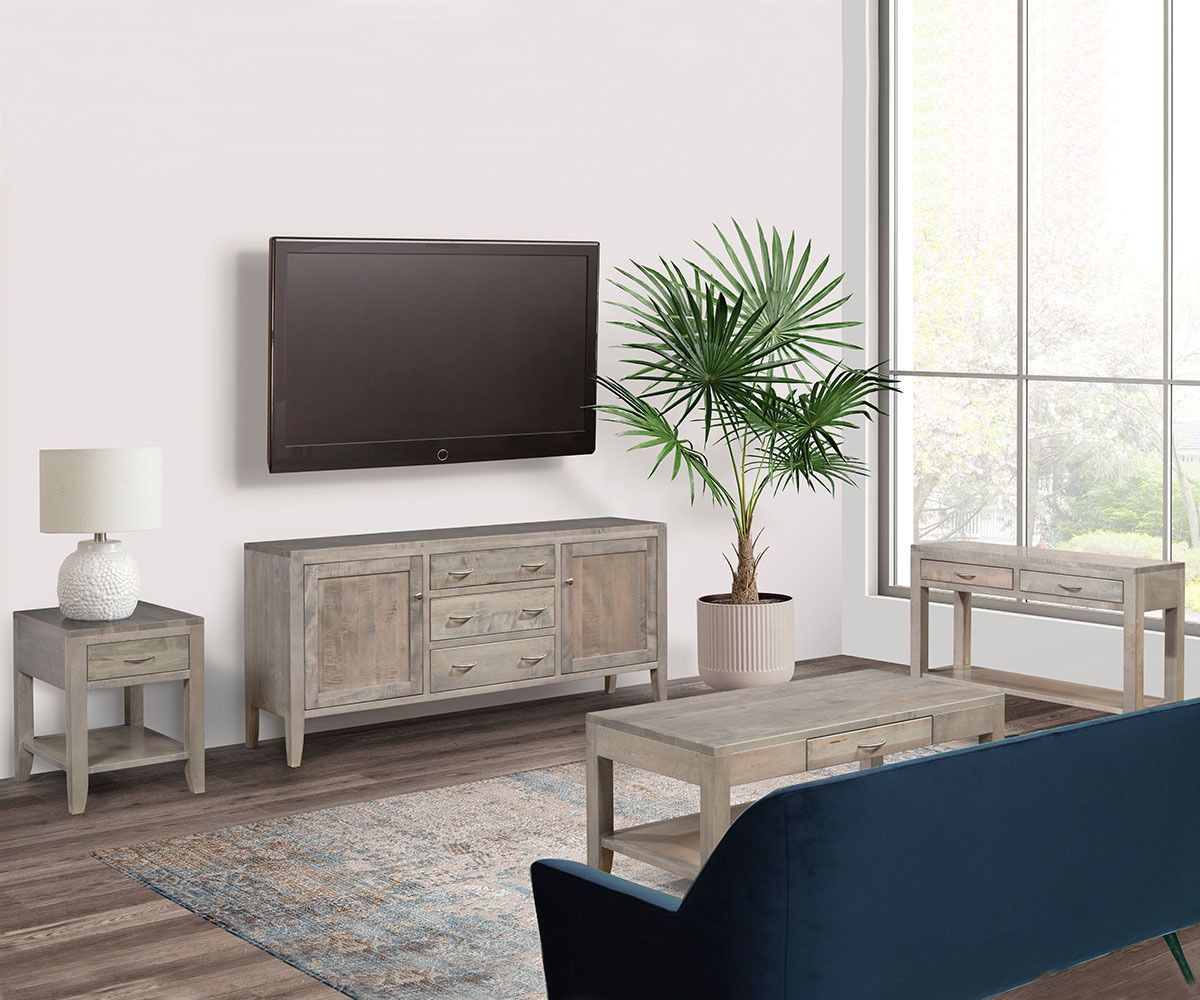 Living room with TV above a gray cabinet, a sofa, and large window.