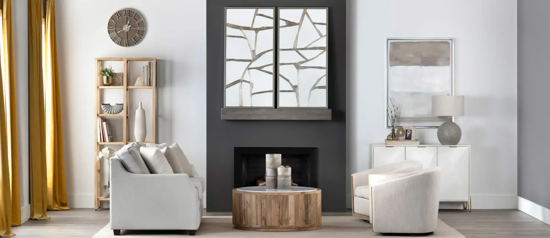 Living room with modern furniture, fireplace, art, and gold curtains.