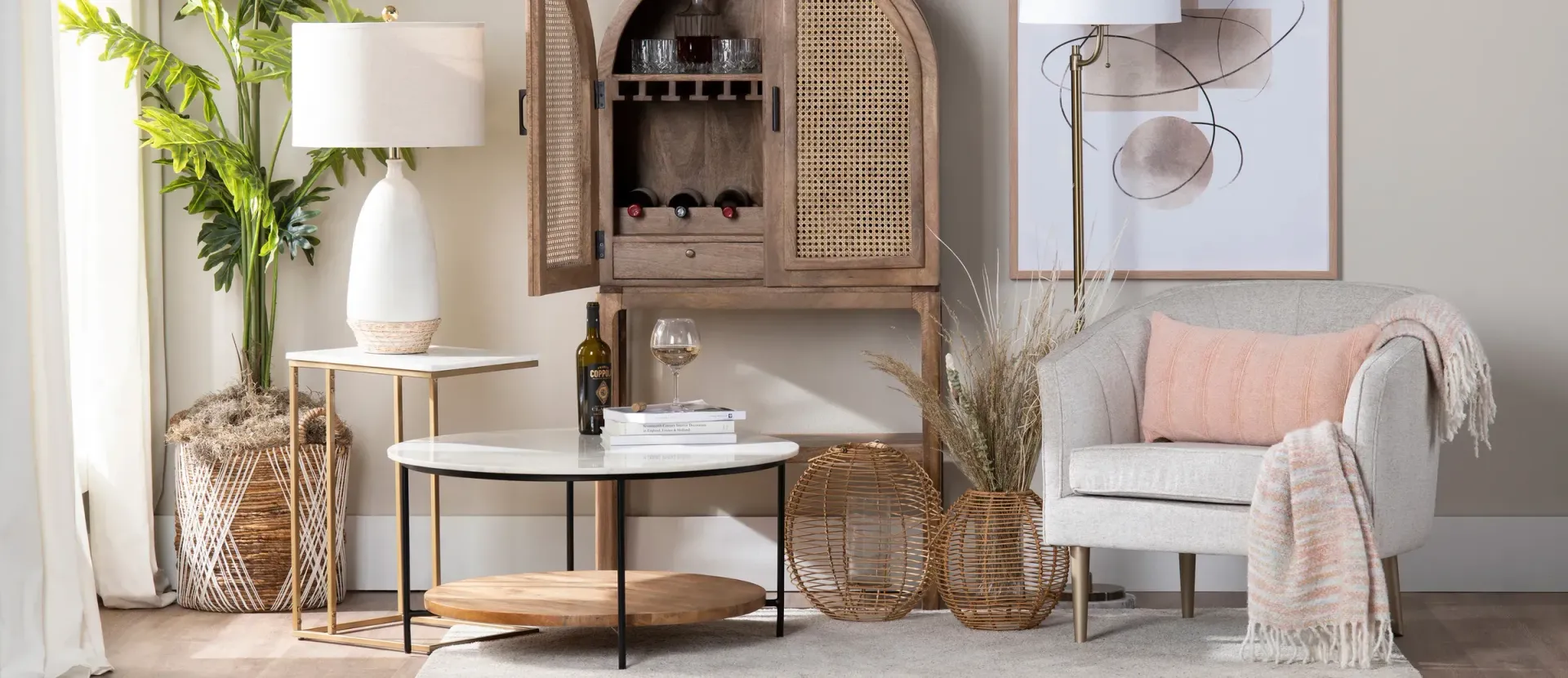 Living room with furniture, including a chair, side tables, and a cabinet with decor.