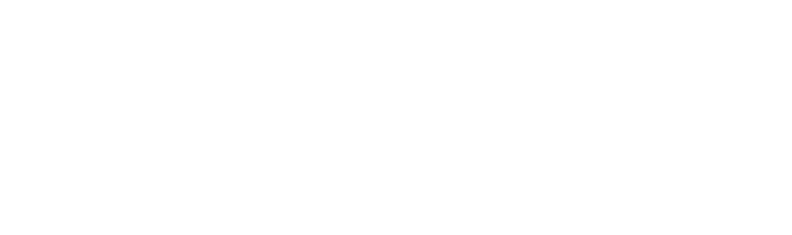 Nahaufnahme eines kleinen, braun gefleckten weißen Eis, das auf einer strukturierten, hellen Oberfläche ruht.
