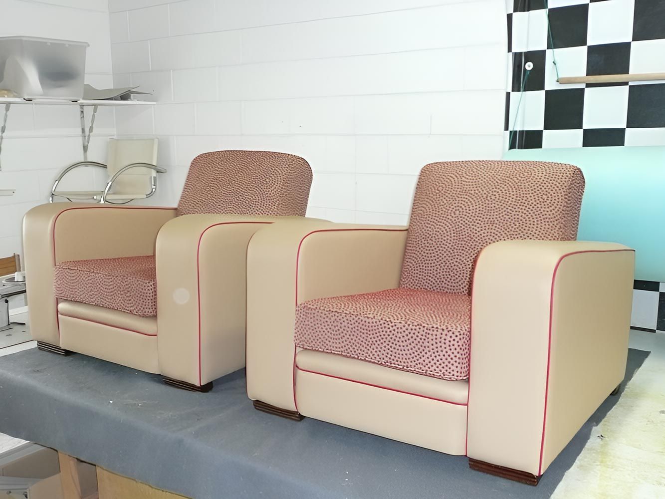 Two Chairs In A Room With A Checkered Wall — Stitch Master in Manunda, QLD