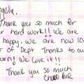 A handwritten thank you note on a piece of paper.