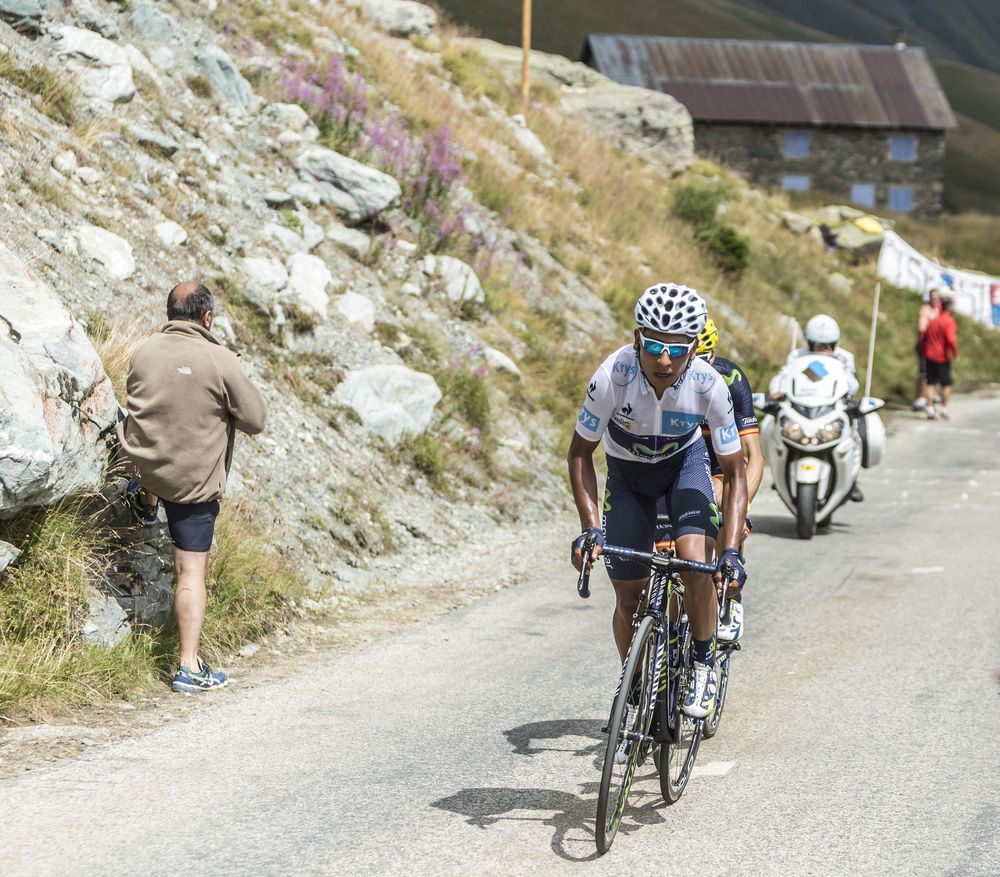 COL DE LA CROIX DE FER, FRANCE - JULY 25: Nairo Quintana in White Jersey climbing to the Col de la Croix de Fer in Alps during the stage 20 of Le Tour de France on July 25, 2015. 