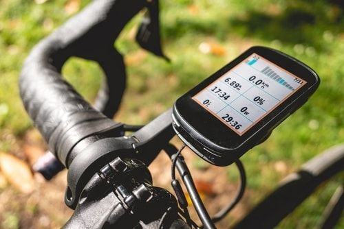 bicycle cycling computer attached to the handlebars of a road bike