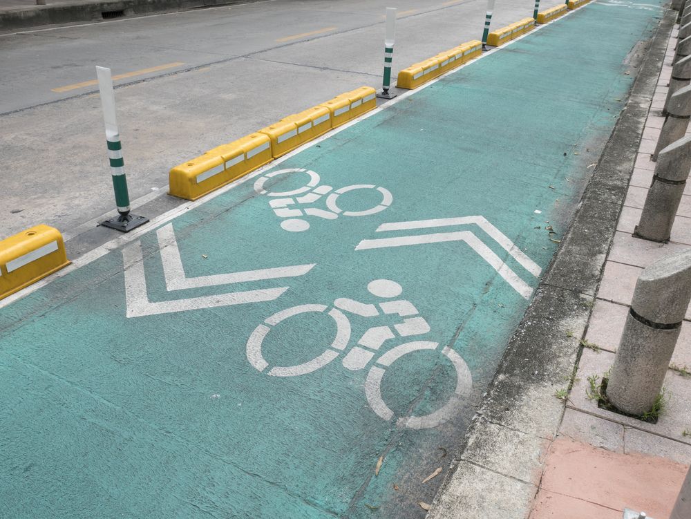 a protected bicycle lane with barriers from traffic
