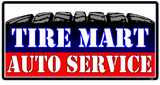 Tire Mart Auto Service sign in bold blue and red lettering on a black background.