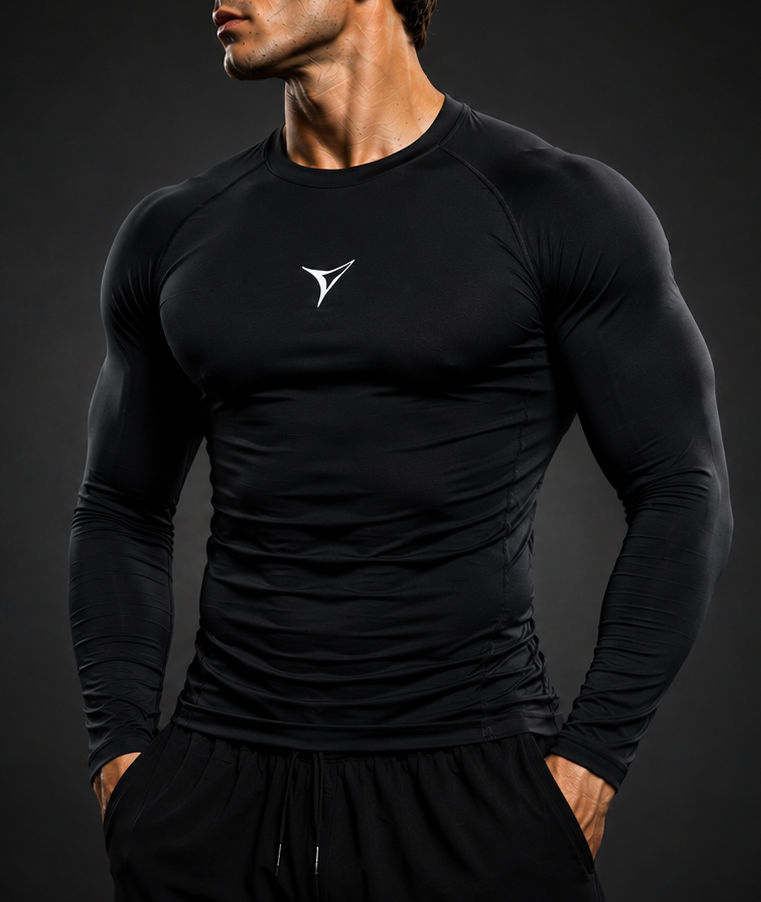 Black long-sleeve athletic shirt with a white logo, worn by a model against a dark background