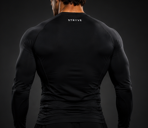 Black long-sleeve athletic shirt with a white logo, worn by a model against a dark background