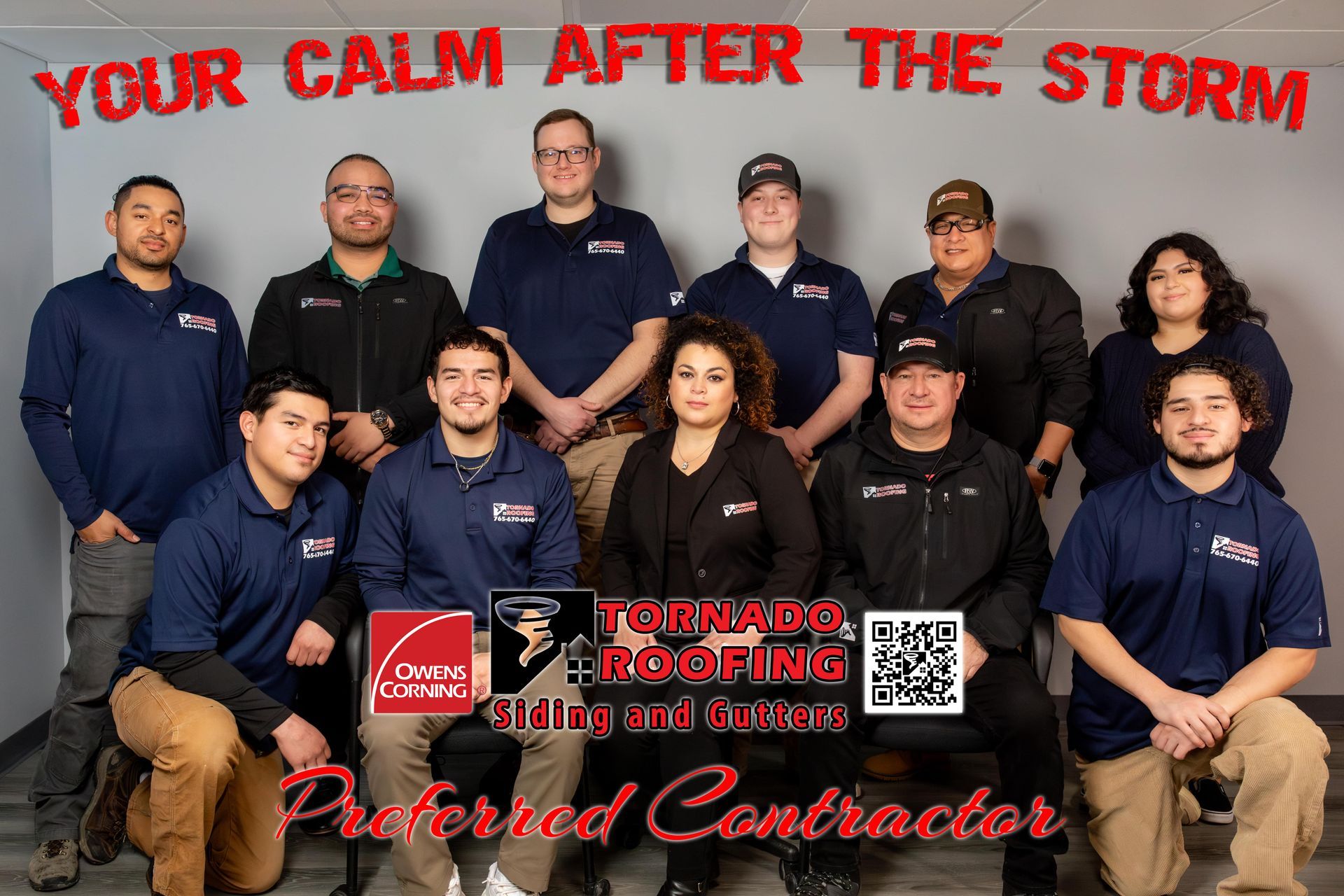 Tornado Roofing team photo. Group of people in a business setting. Text: