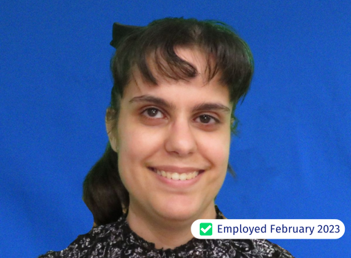 A woman is smiling and has been employed since february 2023