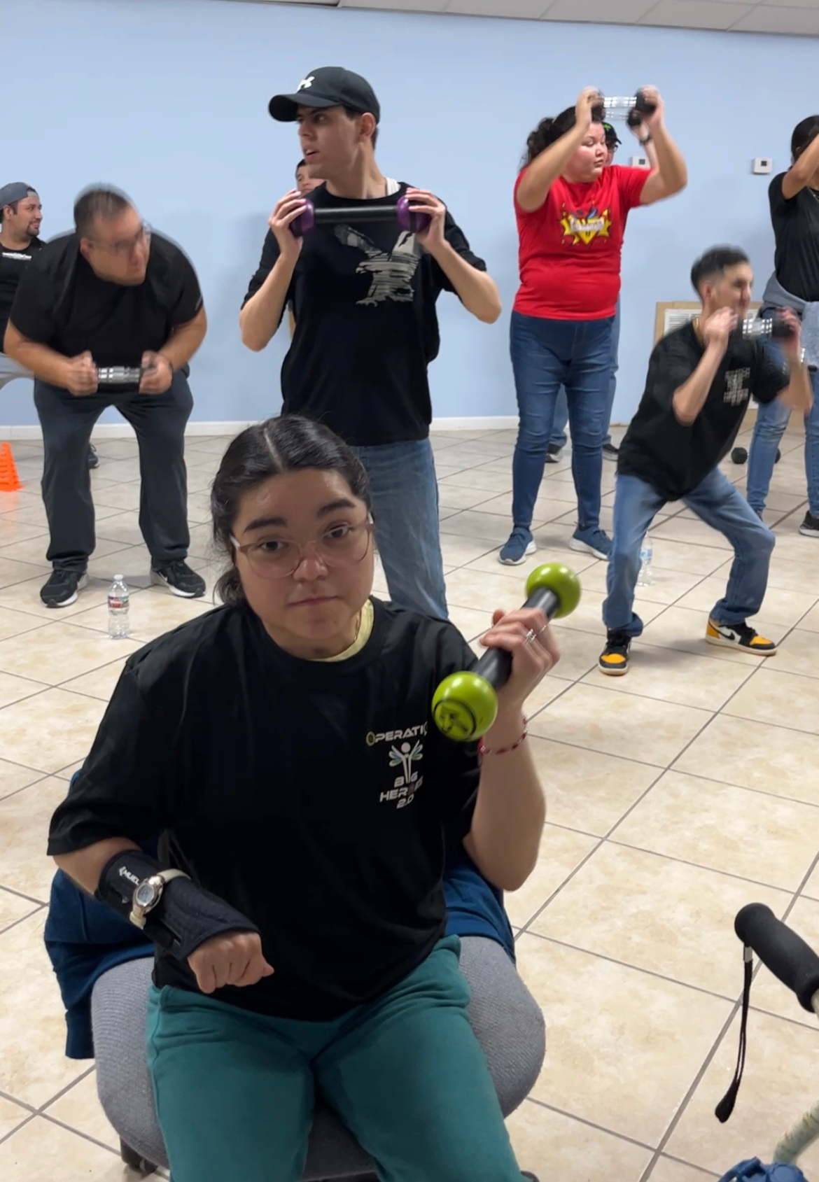 A group of people are playing a game in a room.