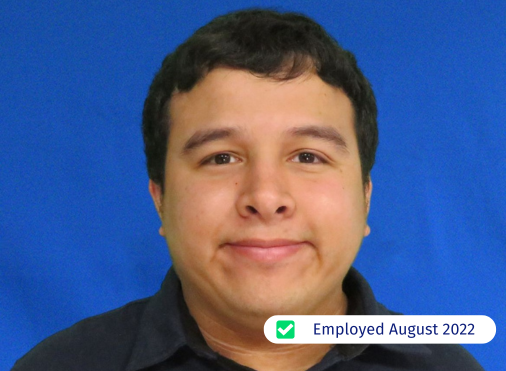A man is smiling and has been employed since august 2022