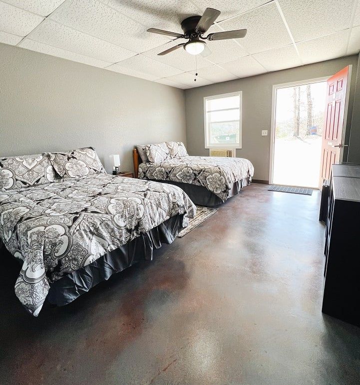motel room with queen beds
