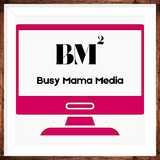A pink computer monitor with the words `` busy mama media '' on it.