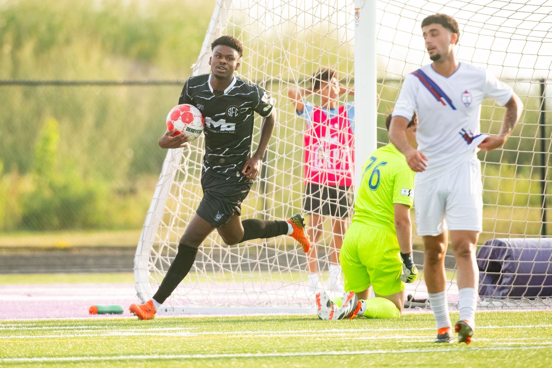 Scrosoppi FC player celebrating a goal in Milton representing the Halton region in Ontario Premier League soccer