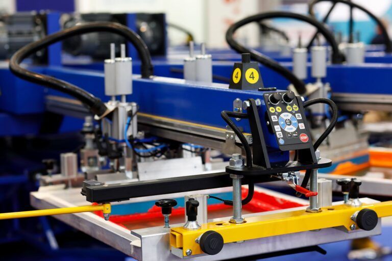 Close up image of an automated screen prtining maching
