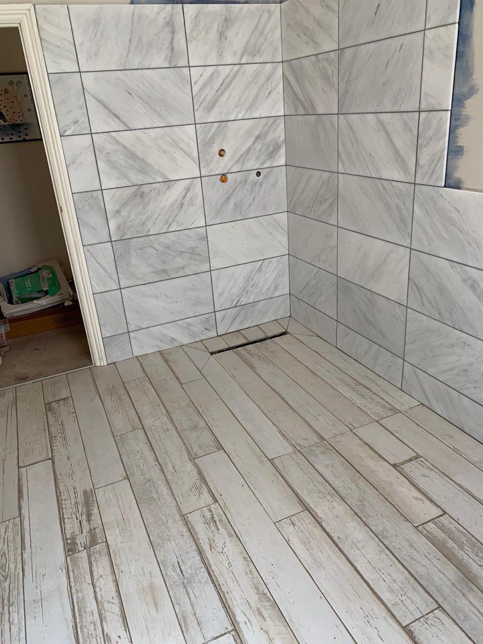 Photo of a Shower and Floor Tiling installation. This photo was taken in Brighton and Hove East Sussex UK