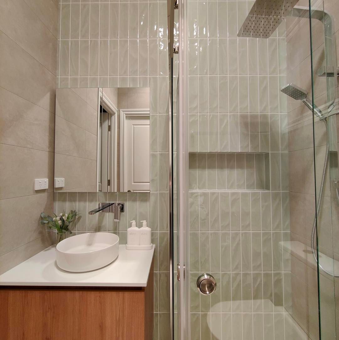 A Bathroom With A Sink, Toilet, Shower, And Mirror – Melbourne, VIC - Deluxe Bathrooms & Tile Centre