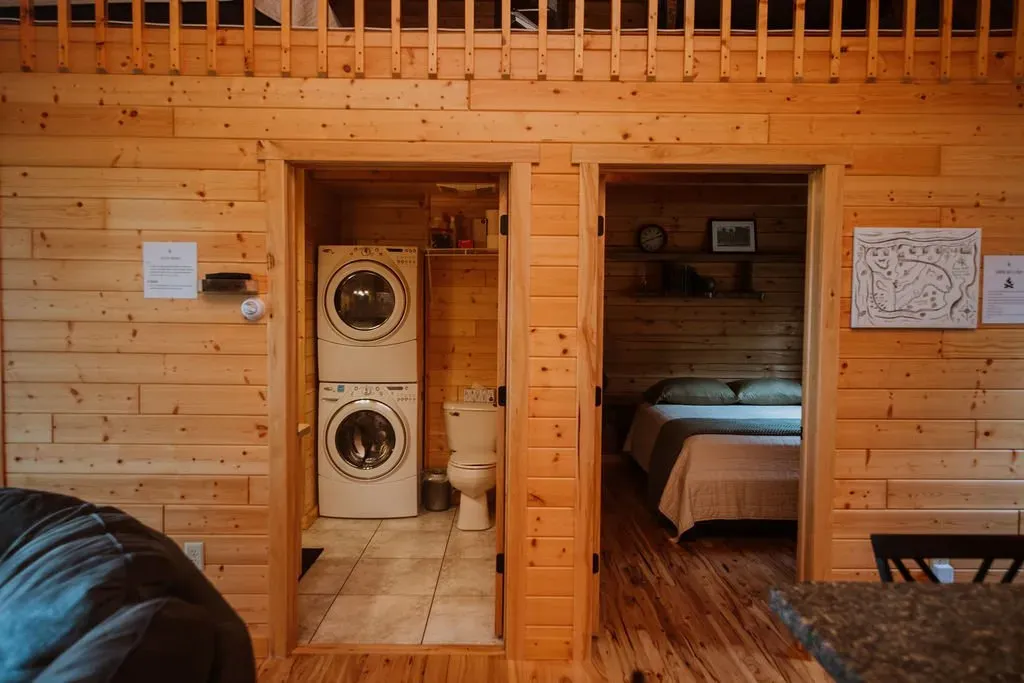 Laundry Area And Bedroom - Mindoro, WI - High Point Retreats