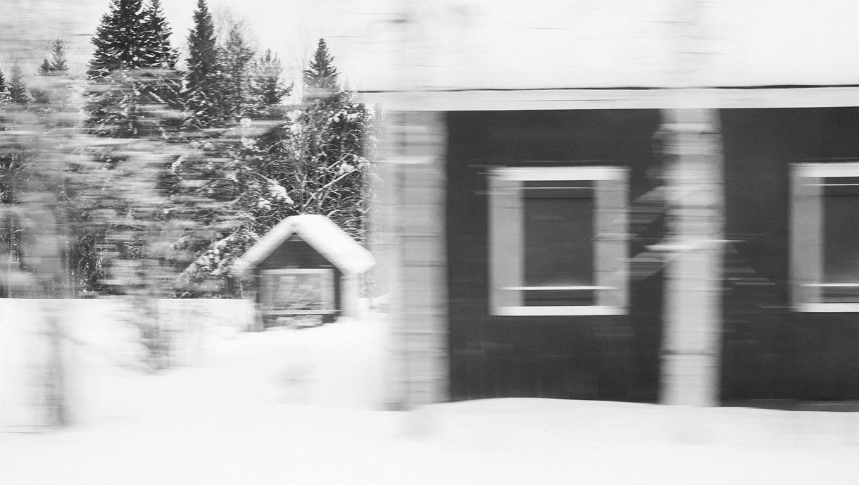 Red cottages in Swedish Lapland during winter time