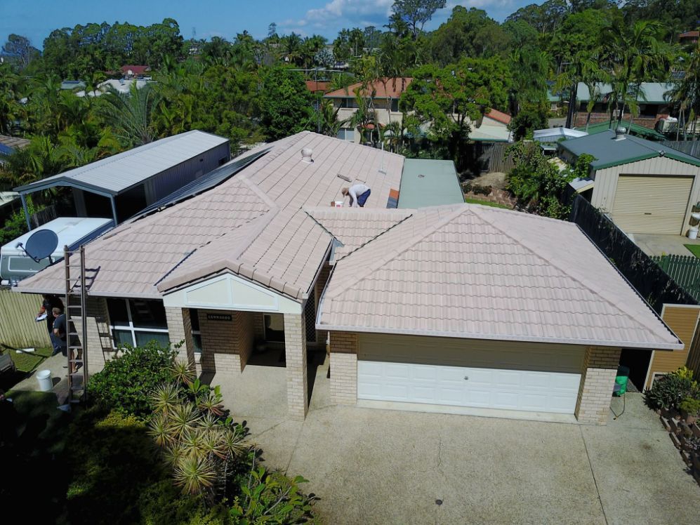 An Aerial View of a House With a Tiled Roof — Stormguard Roofing In Caloundra West, QLD