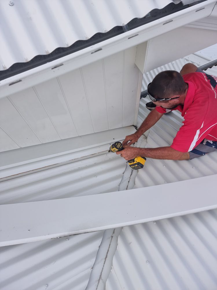 Man Repairing Roof