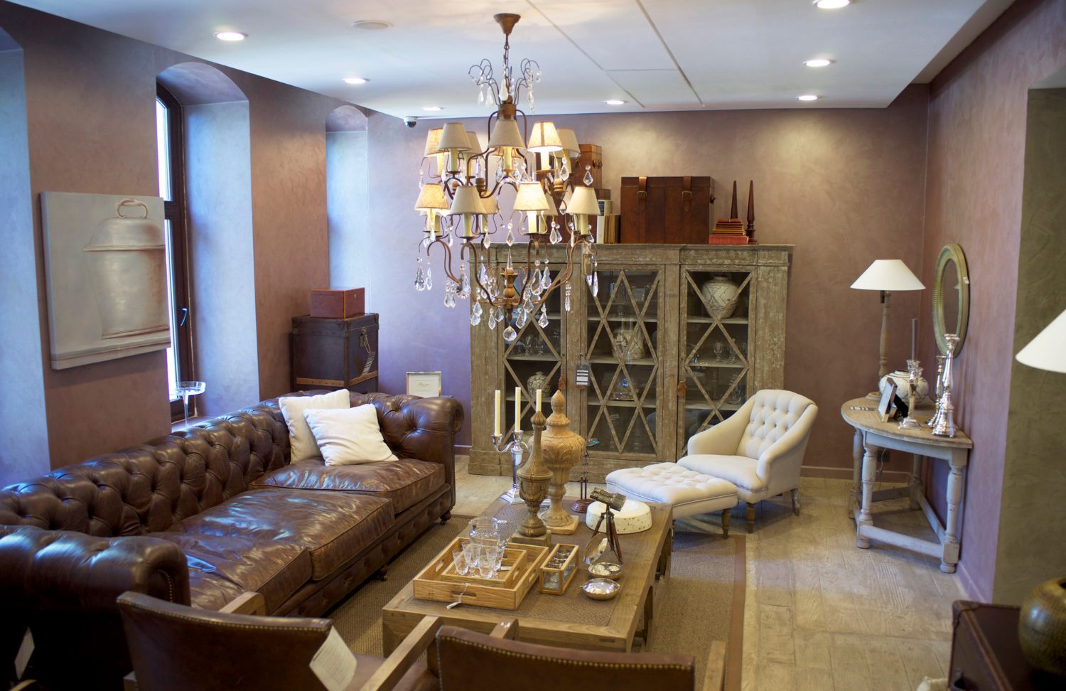 A living room filled with furniture and a chandelier