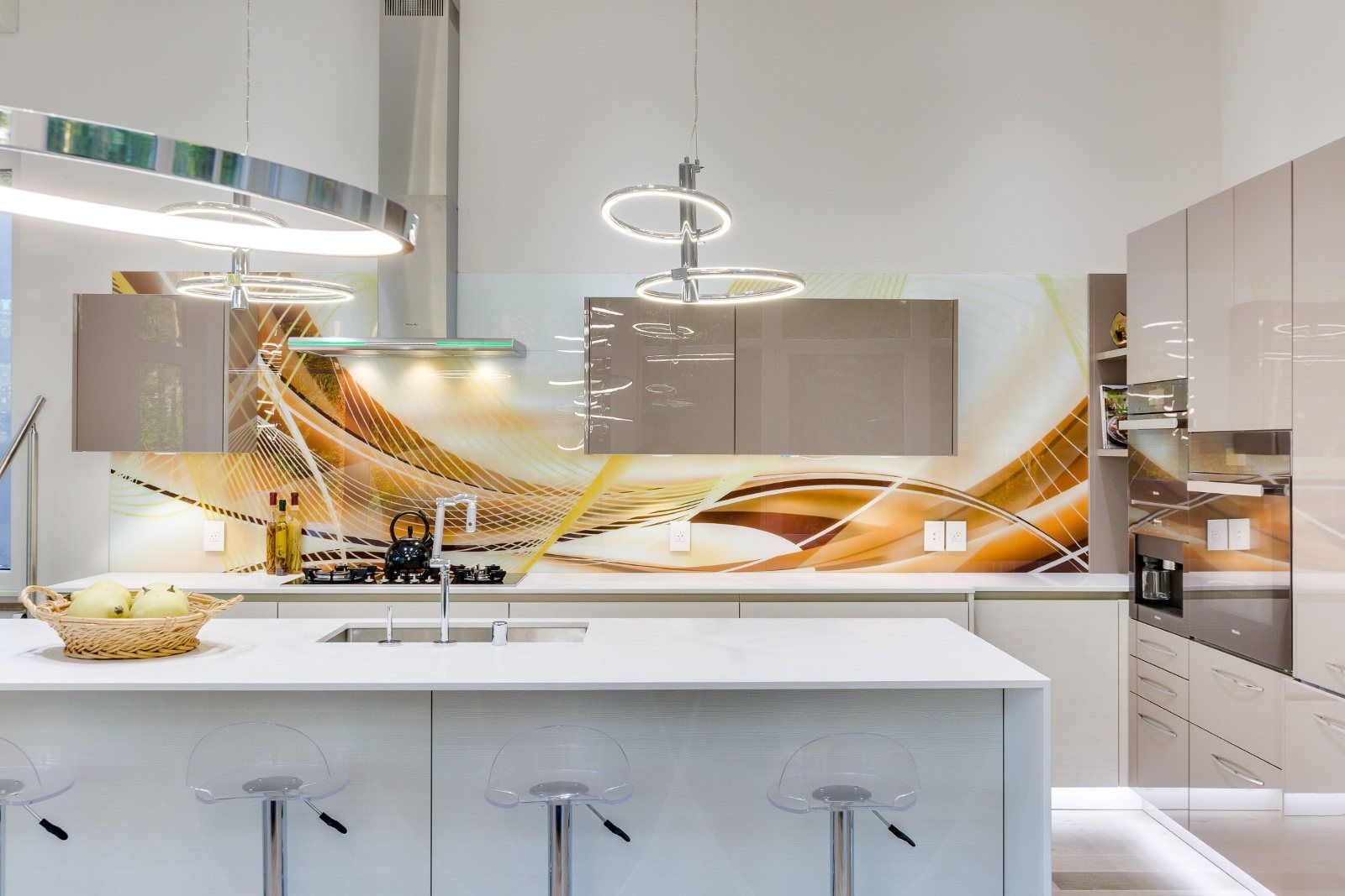 A kitchen with a large island and a sink.
