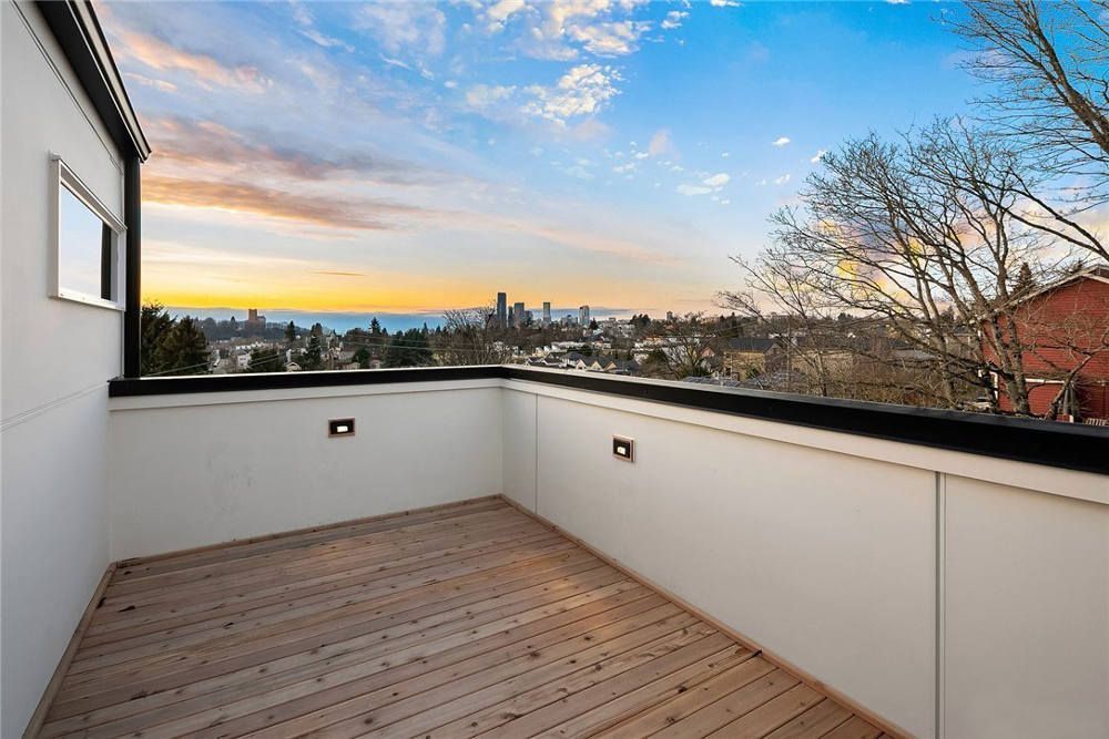 There is a balcony with a view of the city.