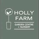 a sign for Holly Farm