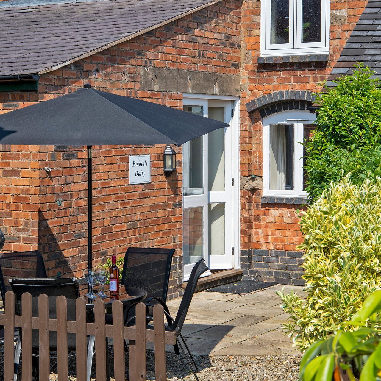 Emma's Dairy holiday let with patio table and chairs