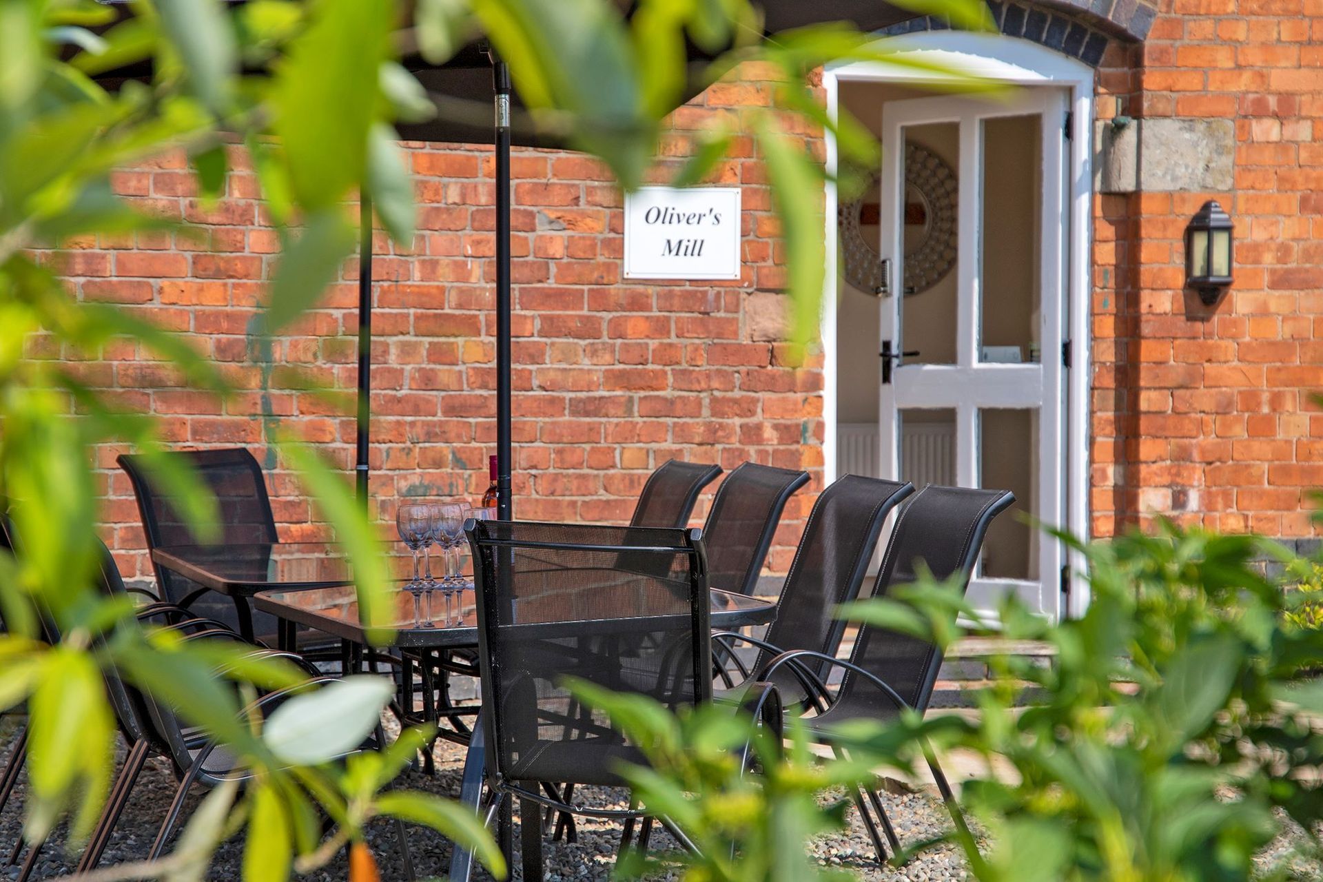 Oliver's Mill holiday let with patio table and chairs