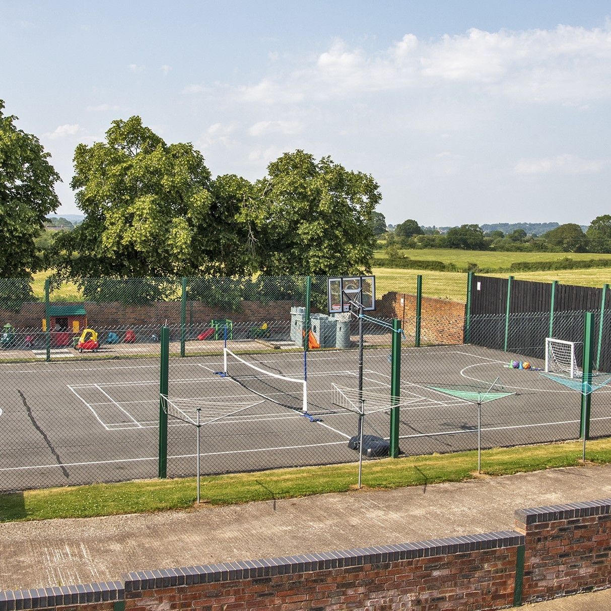Sports court with sports nets and countryside views