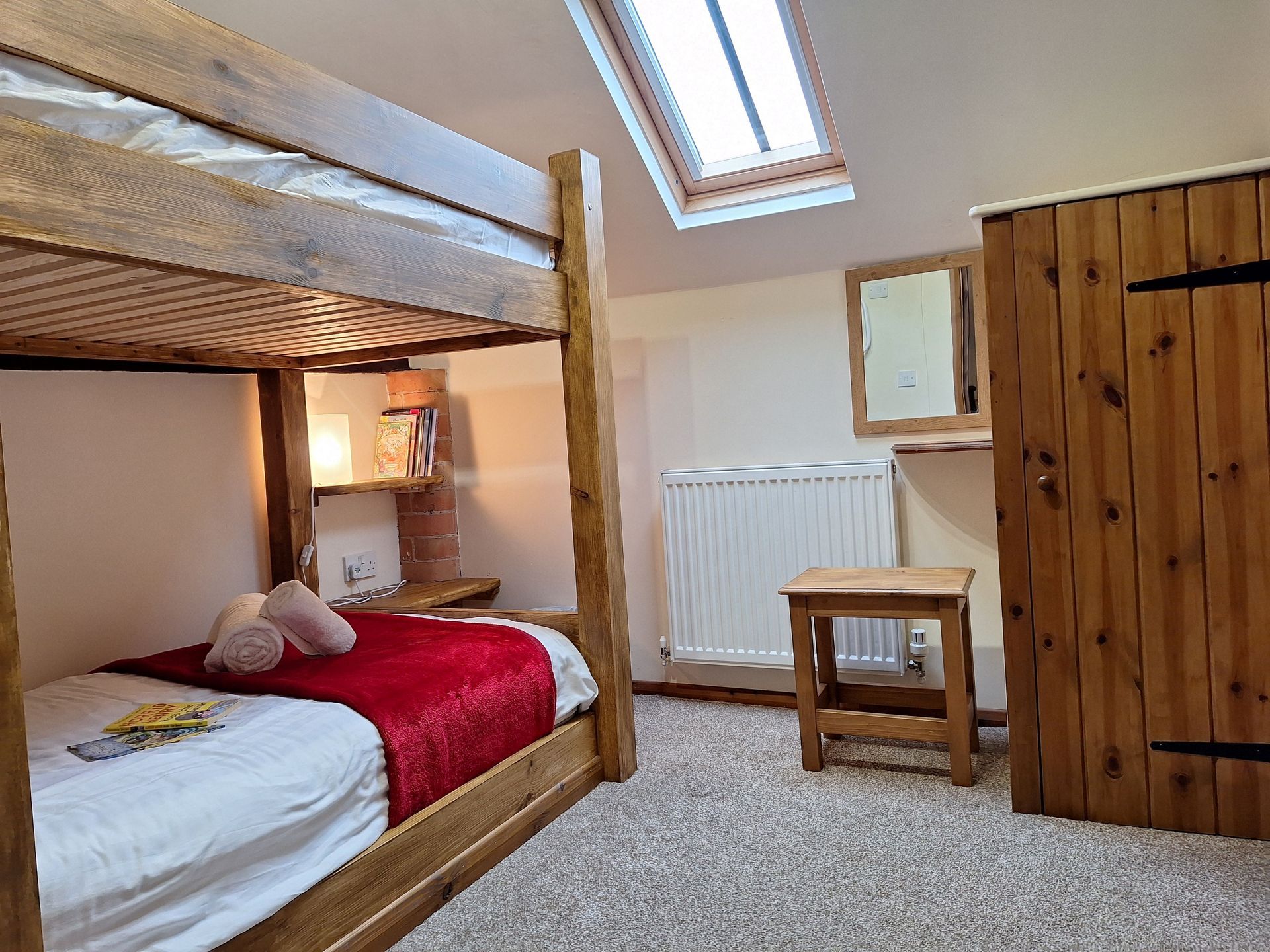 Wooden bunkbeds and wooden children's wardrobe