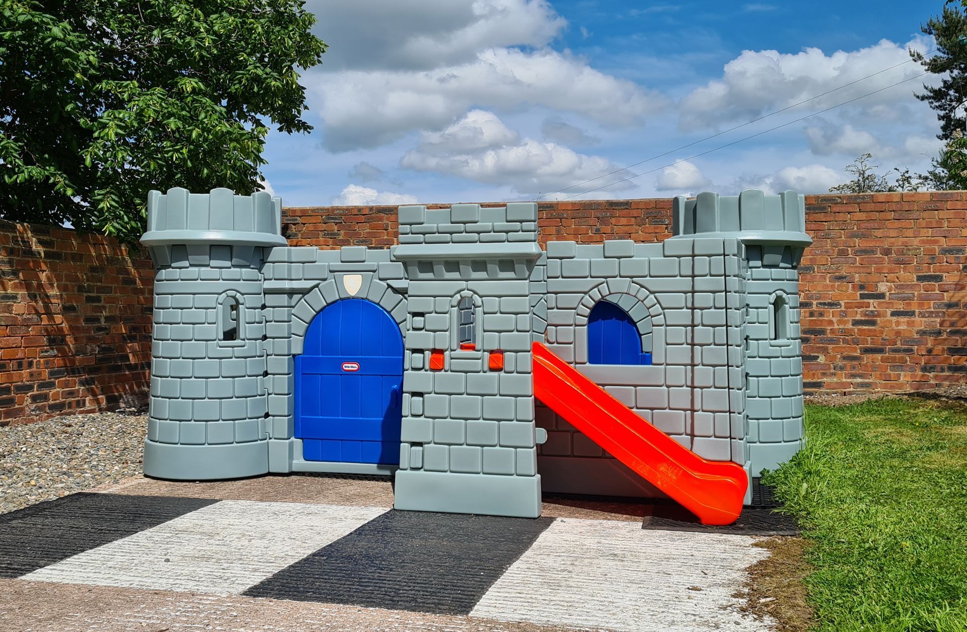 Play Castle with slides on a sunny day 