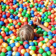 a child in a ball pit