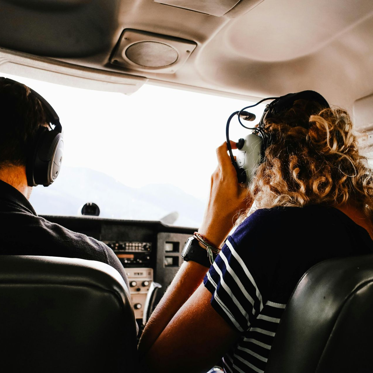 Shropshire Aero Club Two people in a small aeroplane cockpit