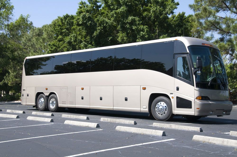 Shuttle Bus With Tinted Windows Waiting For Passengers — Shuttle Buses from Hervey Bay in Dundowran Beach, QLD