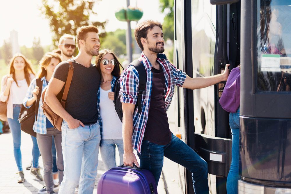 A Group Of Tourists Preparing To Get On The Bus — Shuttle Buses from Hervey Bay in Dundowran Beach, QLD