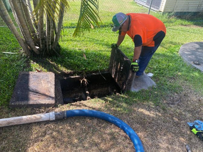 septic tank cleaning in a yard - Ecotreat Solutions NT