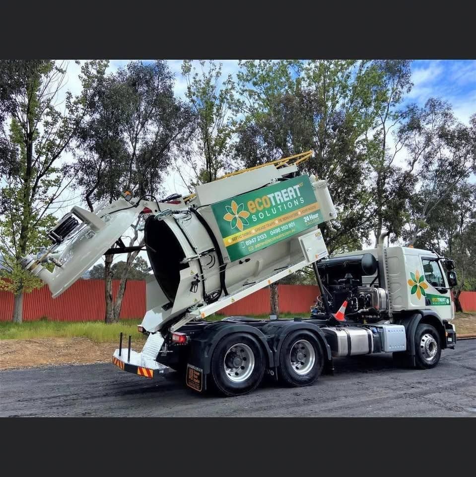 A Vacuum Truck is Parked on the Side of the Road — Ecotreat Solutions NT in Humpty Doo, NT