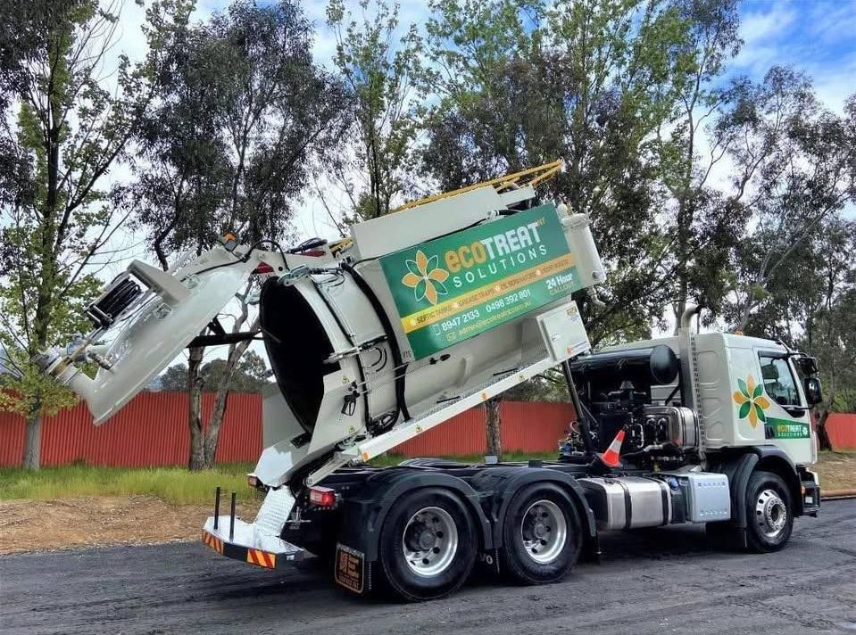 A Vacuum Truck is Parked on the Side of the Road — Ecotreat Solutions NT in Winnellie, NT