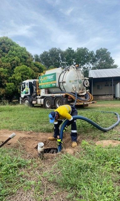 Man Working in the Field with Vacuum Truck — Ecotreat Solutions NT in Winnellie, NT
