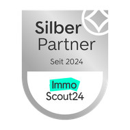 Ein silbernes Abzeichen mit der Aufschrift „Silber Partner seit 2024“