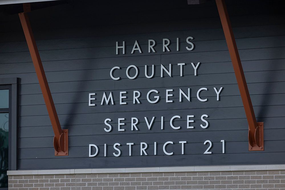 Harris County Emergency Services District 21 sign on a brick building facade