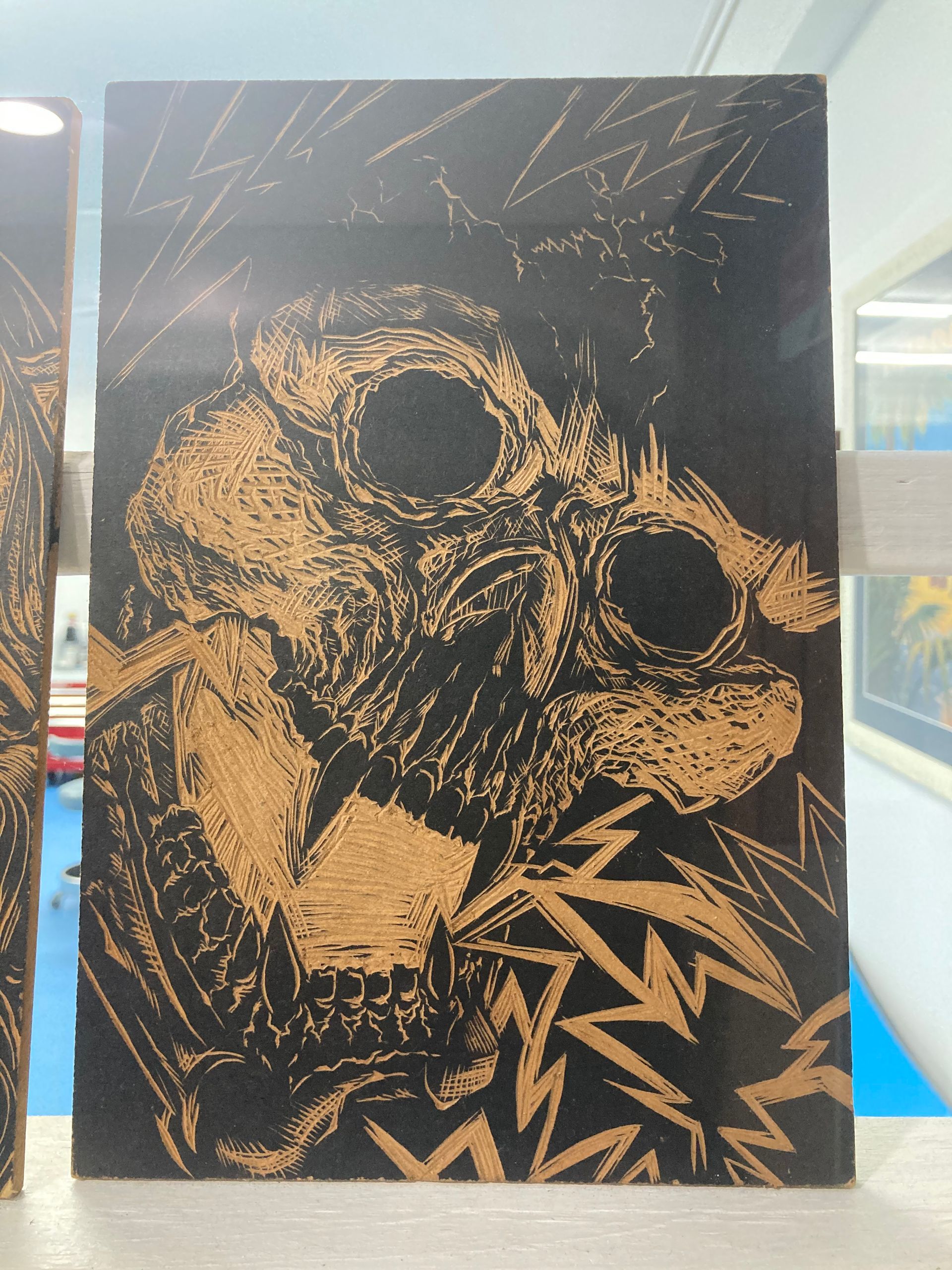 Another Black and Gold Painting of a Bird With Big Eyes — La Bomba Loca Tattoo in Cairns City, QLD