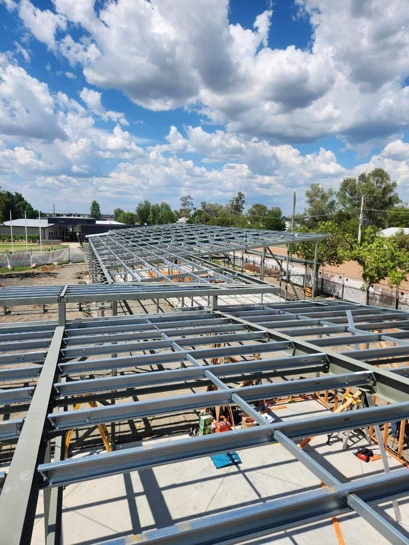 A Large Metal Structure is Being Built on a Sunny Day — Norfab In Blackall, QLD