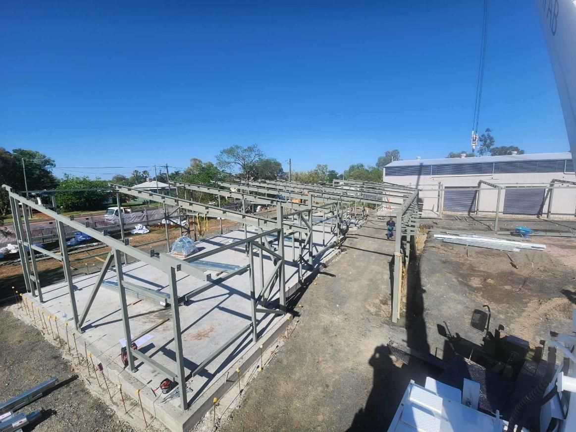A Large Metal Structure is Being Built on Top of a Dirt Field — Norfab In Blackall, QLD