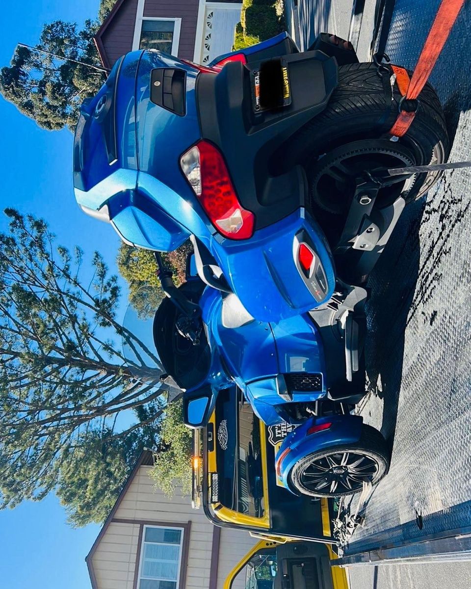 AT Towing flatbed loaded and ready for transport