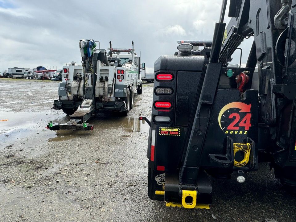 AT Towing wrecker positioned for a recovery